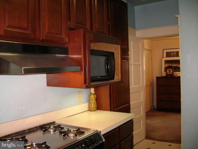 410 Silver Spring Avenue Silver Spring, MD 20910 - Photo 10 of 12 Rich Hardwood Cabinets, Gas Cooking