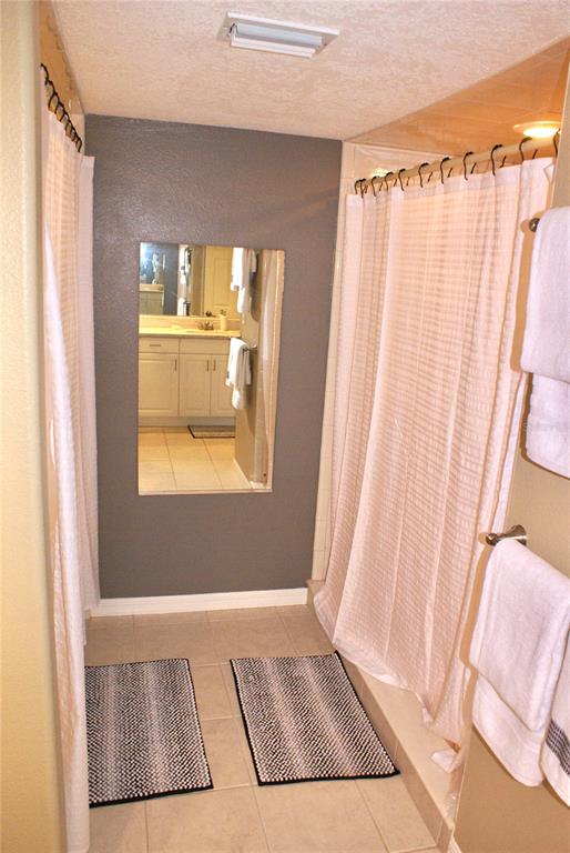 601 Shreve Street, Unit 15B Punta Gorda, FL 33950 - Photo 21 of 29 a view of a bedroom with wooden floor and front door