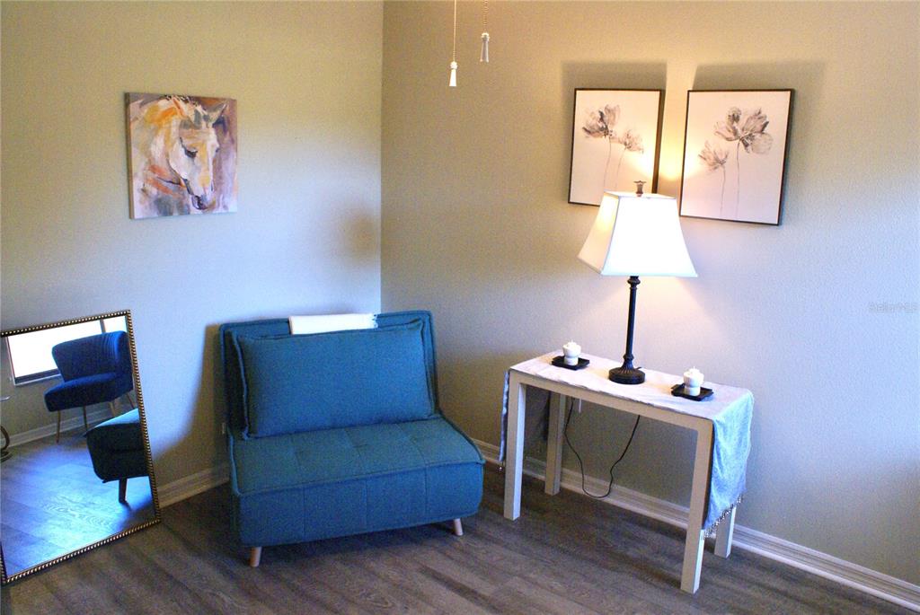 601 Shreve Street, Unit 15B Punta Gorda, FL 33950 - Photo 25 of 29 a living room with furniture and a lamp