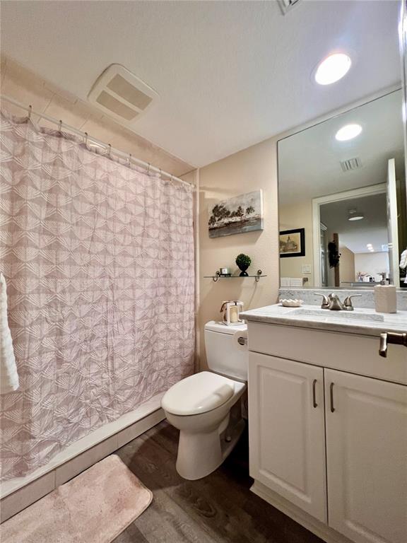 601 Shreve Street, Unit 15B Punta Gorda, FL 33950 - Photo 28 of 29 a bathroom with a toilet a sink and a shower