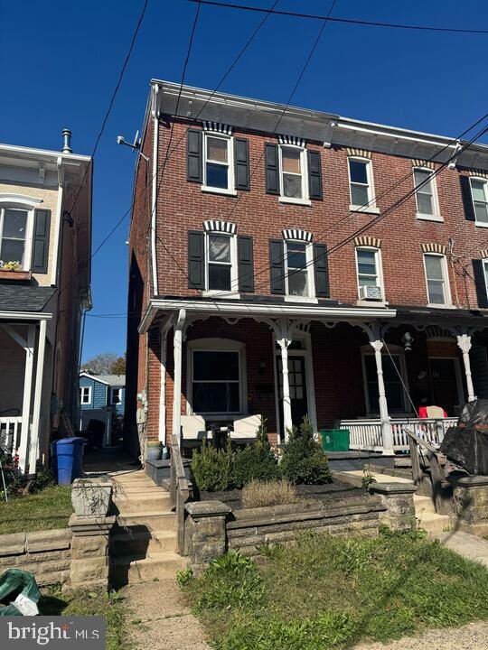 405 Walnut Street Royersford, PA 19468 - Photo 2 of 26 a front view of a house with garden