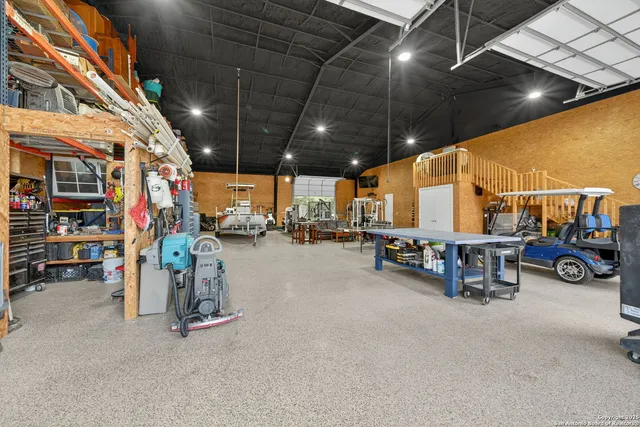 a view of parking garage with cars