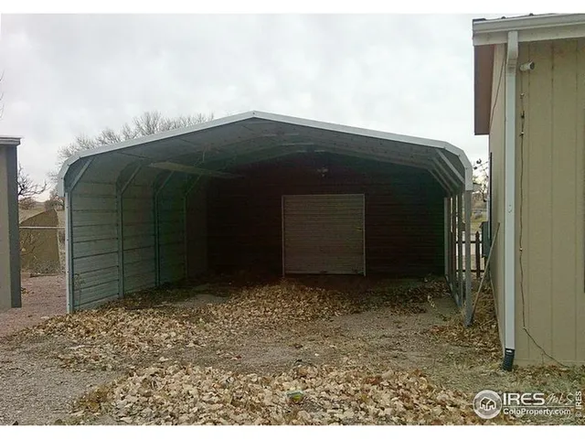 a black house with a outdoor space