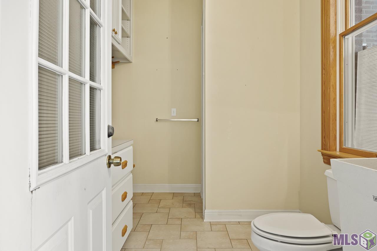 15751 Port Hudson-Pride Road Pride, LA 70770 - Photo 21 of 43 Guest Bathroom for Outdoor Activities