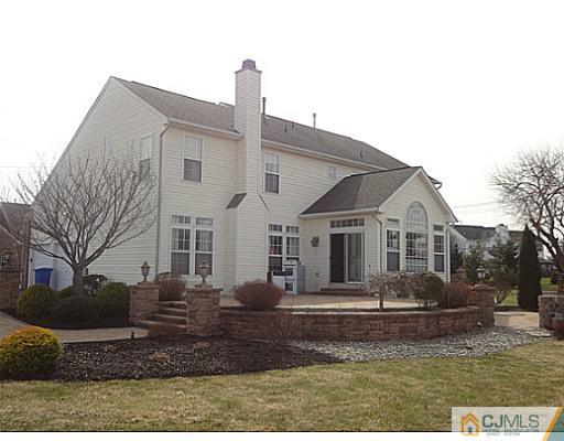 1 Sunflower Road Somerset, NJ 08873 - Photo 3 of 25 a front view of a house with a yard