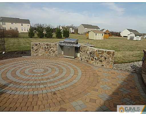 1 Sunflower Road Somerset, NJ 08873 - Photo 4 of 25 a view of a terrace with a outdoor space