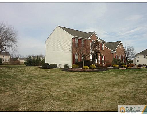 1 Sunflower Road Somerset, NJ 08873 - Photo 7 of 25 a view of a house with a yard
