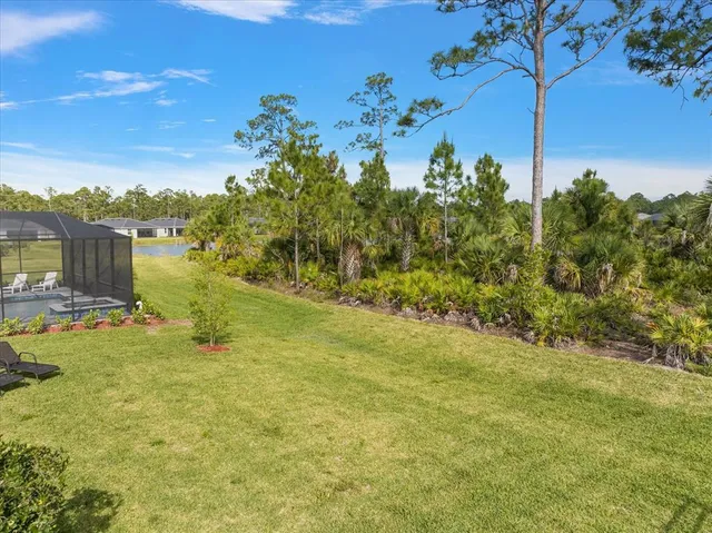 a view of a yard with an outdoor space