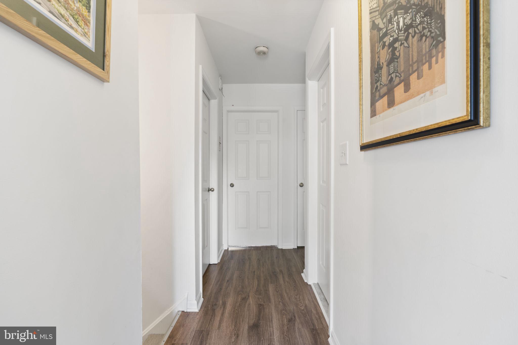 289 Tulip Tree Court Blue Bell, PA 19422 - Photo 28 of 51 a view of a hallway with wooden floor and closet