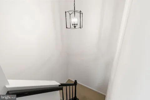 a view of a small space with racks on the wall