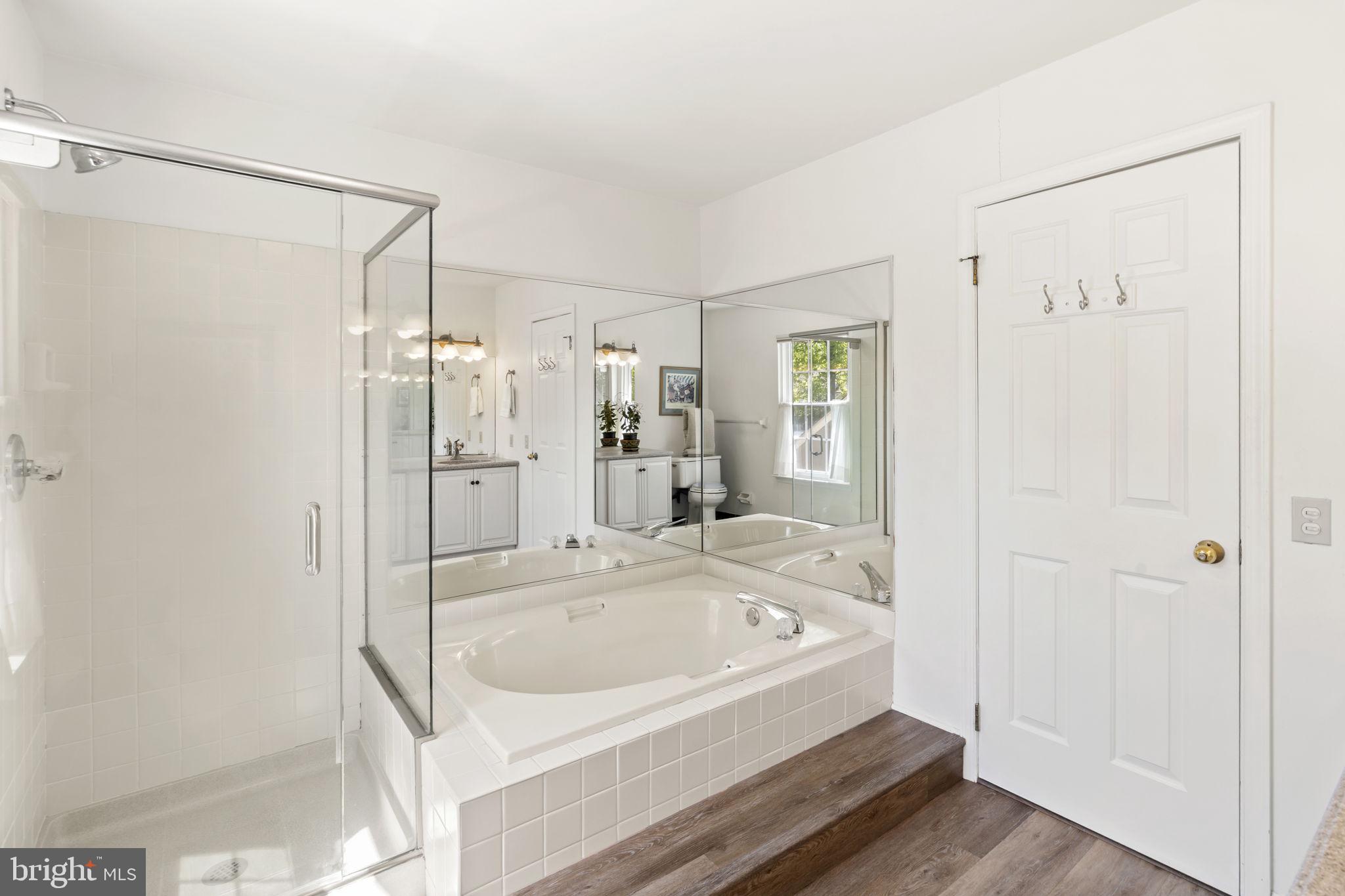 289 Tulip Tree Court Blue Bell, PA 19422 - Photo 41 of 51 a bathroom with a bathtub and a shower