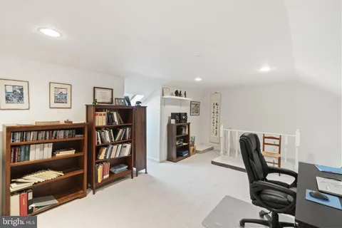a view of a workspace with furniture