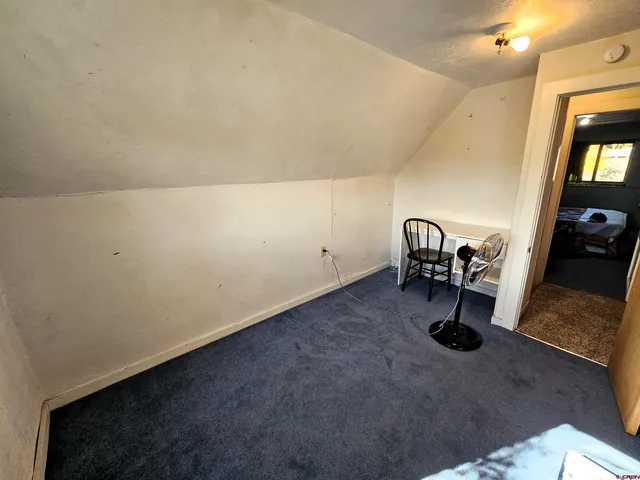 a view of workspace with livingroom view