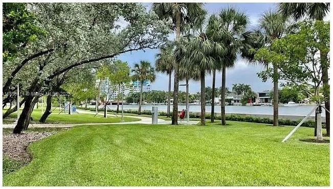 6484 Indian Creek Drive, Unit 307 Miami Beach, FL 33141 - Photo 4 of 4 a view of a park with palm trees