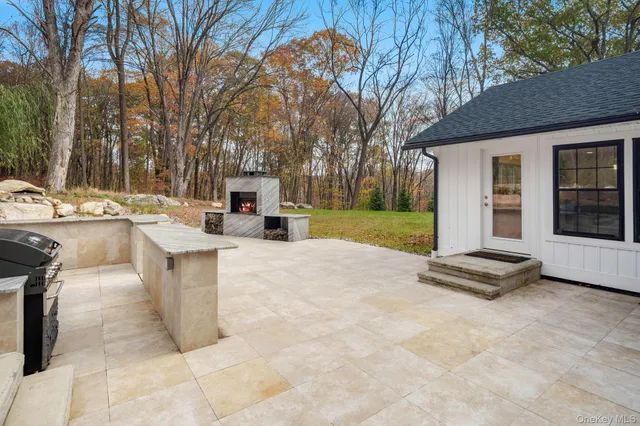 a view of a kitchen with a sink and a stove