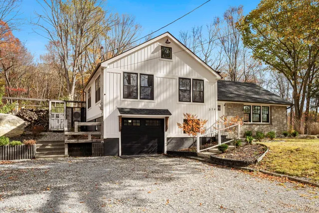 a front view of a house with a patio