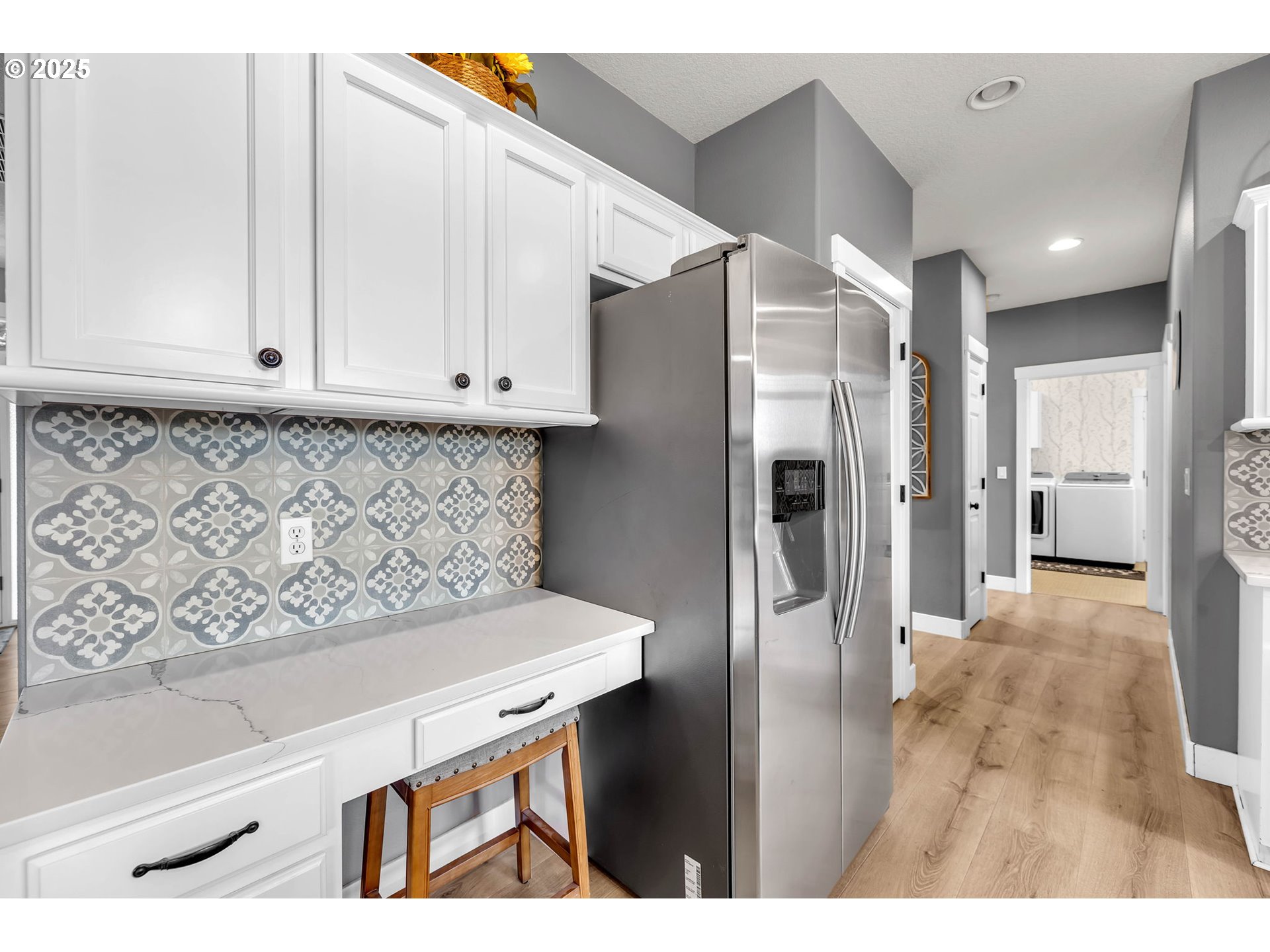 8805 Northeast 179th Street Battle Ground, WA 98604 - Photo 16 of 48 a kitchen with stainless steel appliances granite countertop a refrigerator a stove and a sink