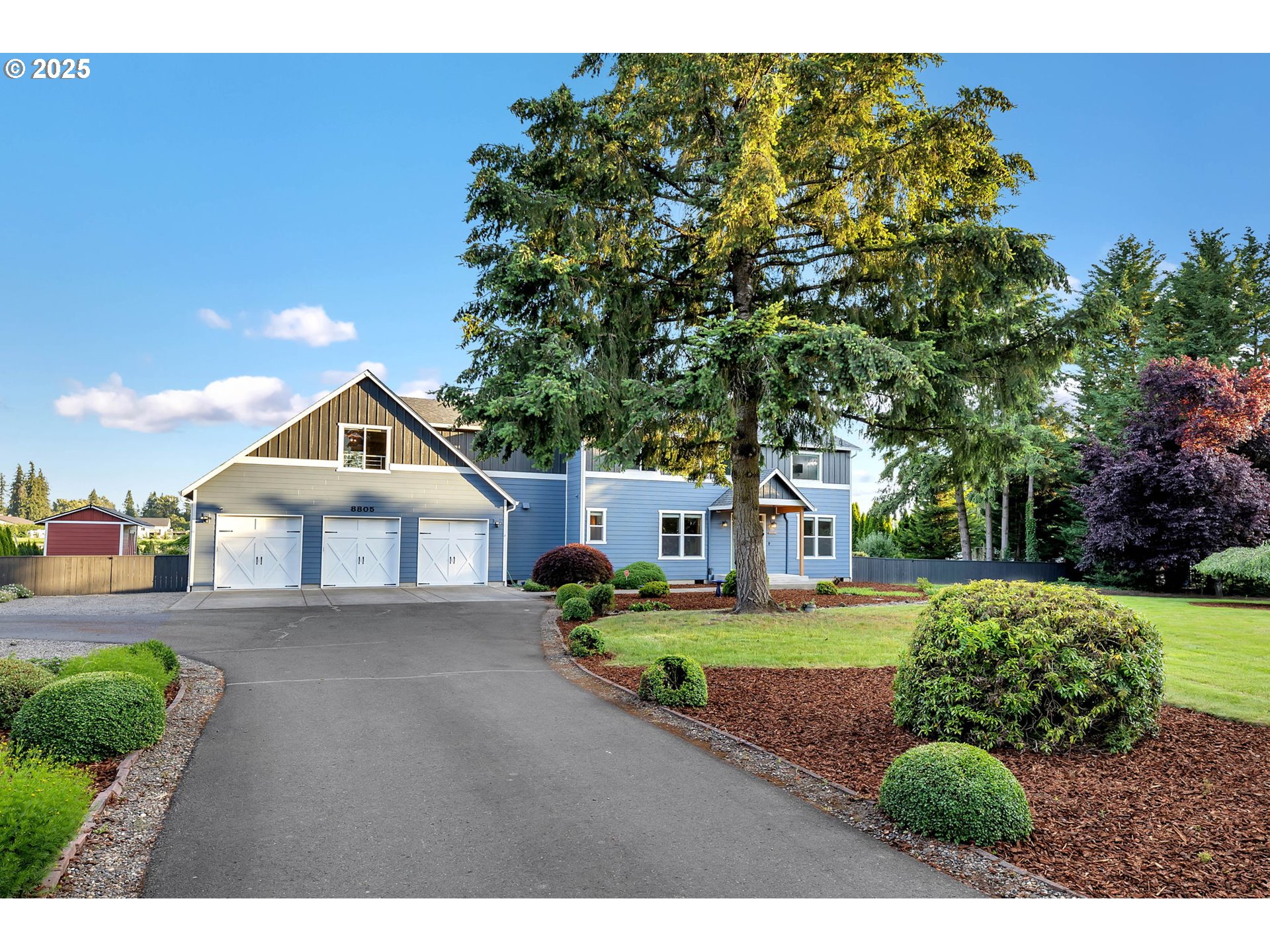 8805 Northeast 179th Street Battle Ground, WA 98604 - Photo 2 of 48 a house view with a garden space