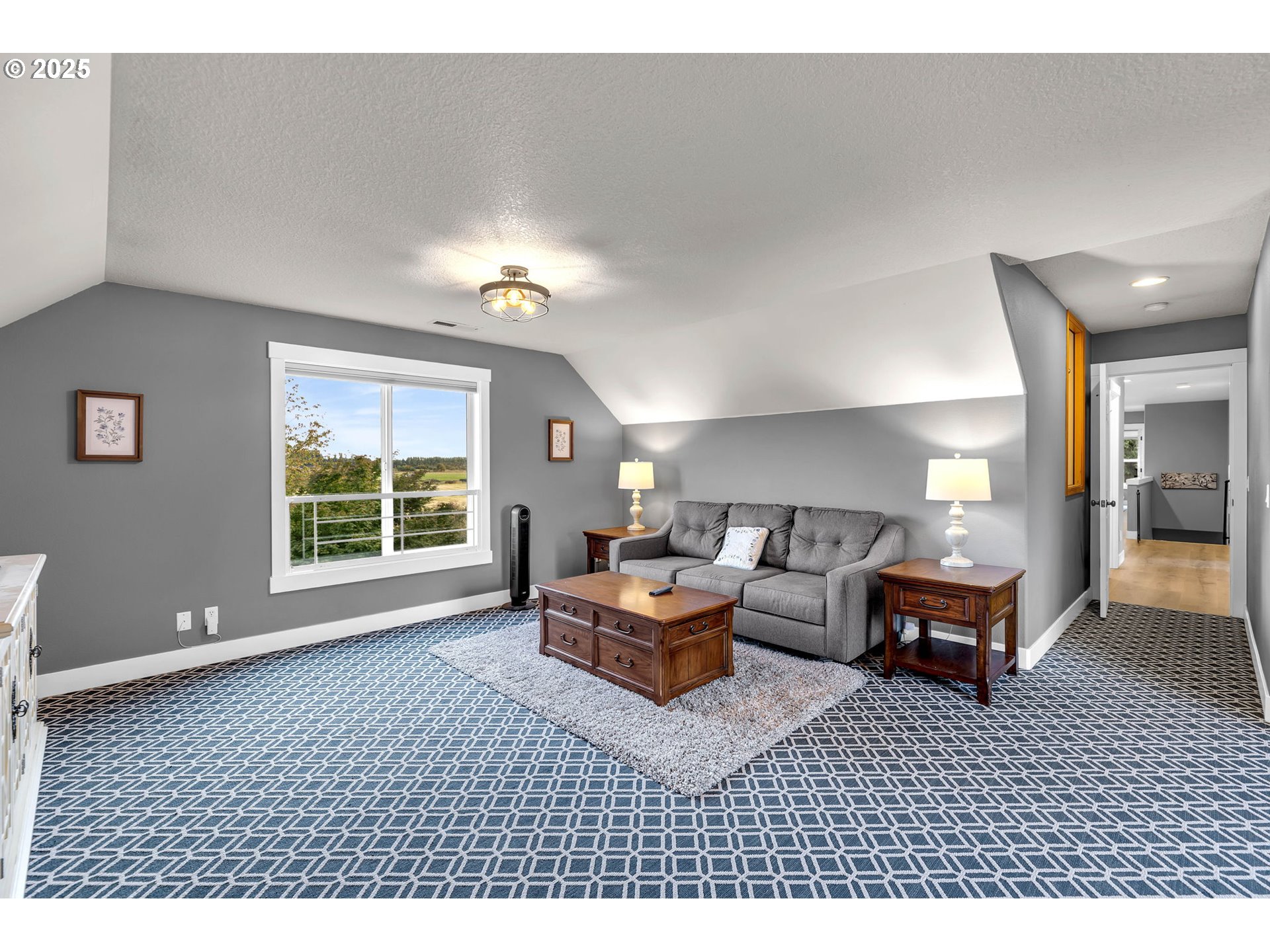 8805 Northeast 179th Street Battle Ground, WA 98604 - Photo 26 of 48 a living room with furniture and a large window