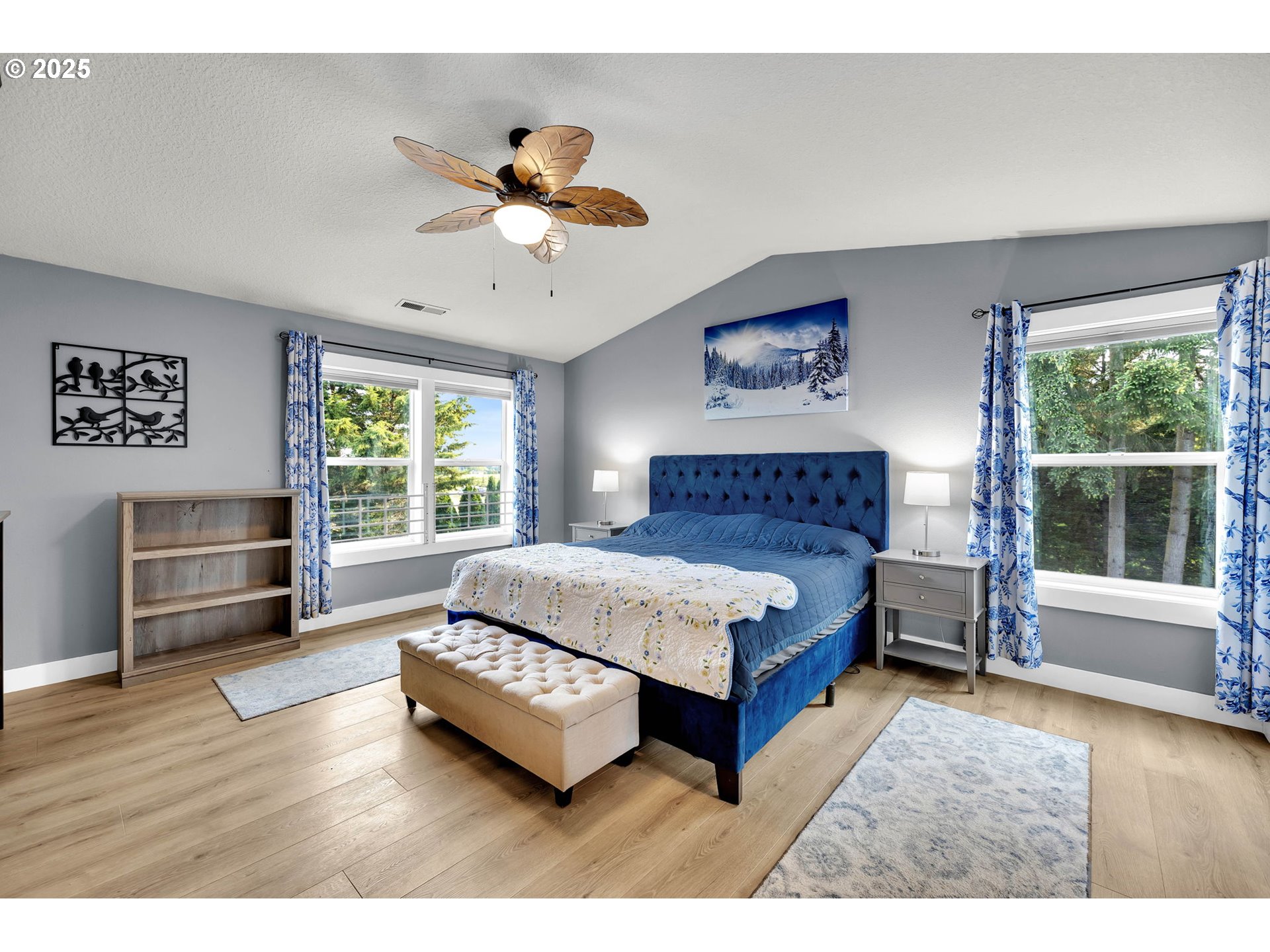 8805 Northeast 179th Street Battle Ground, WA 98604 - Photo 27 of 48 a bedroom with a large bed and a window