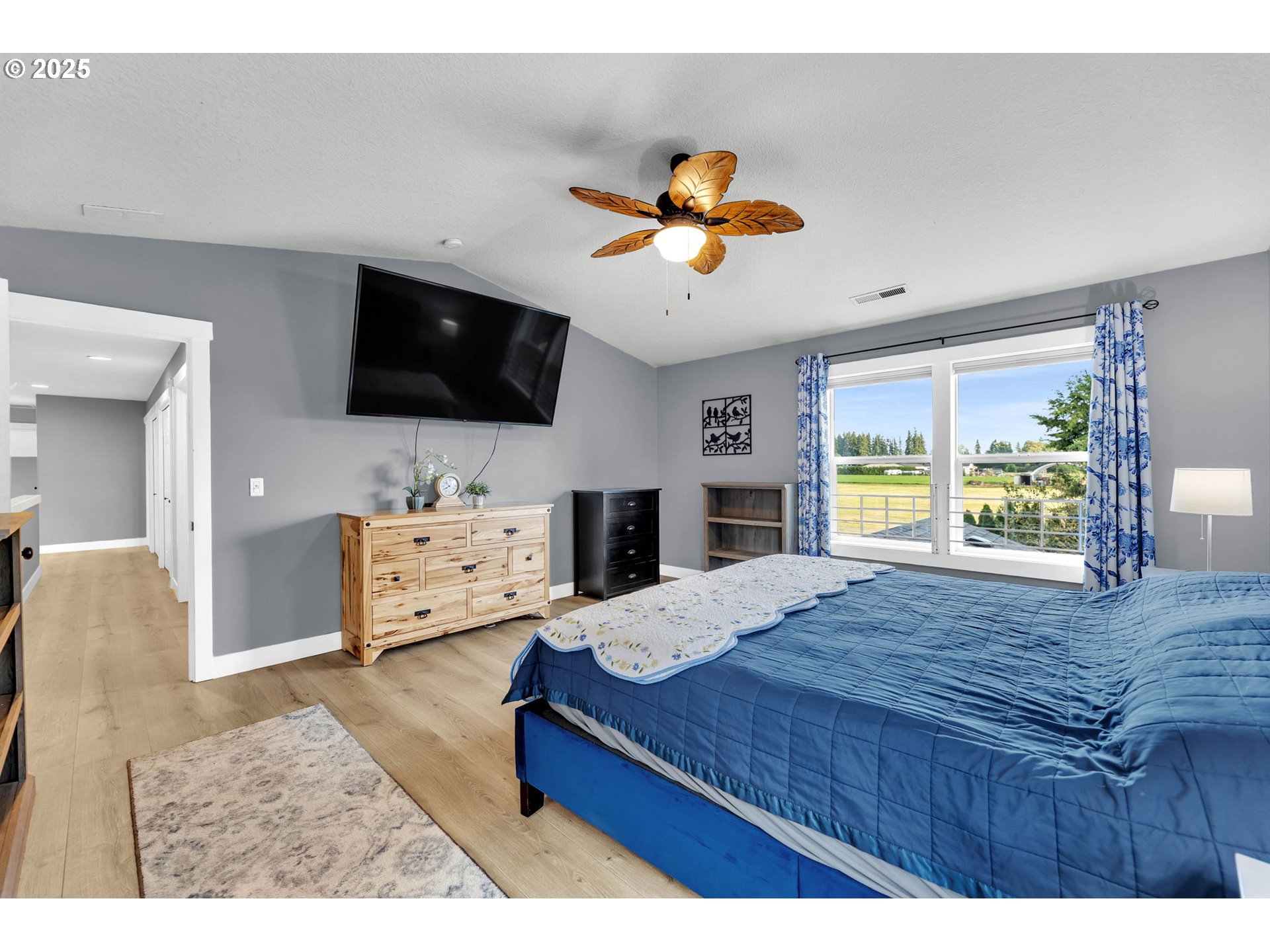 8805 Northeast 179th Street Battle Ground, WA 98604 - Photo 28 of 48 a living room with furniture and a flat screen tv