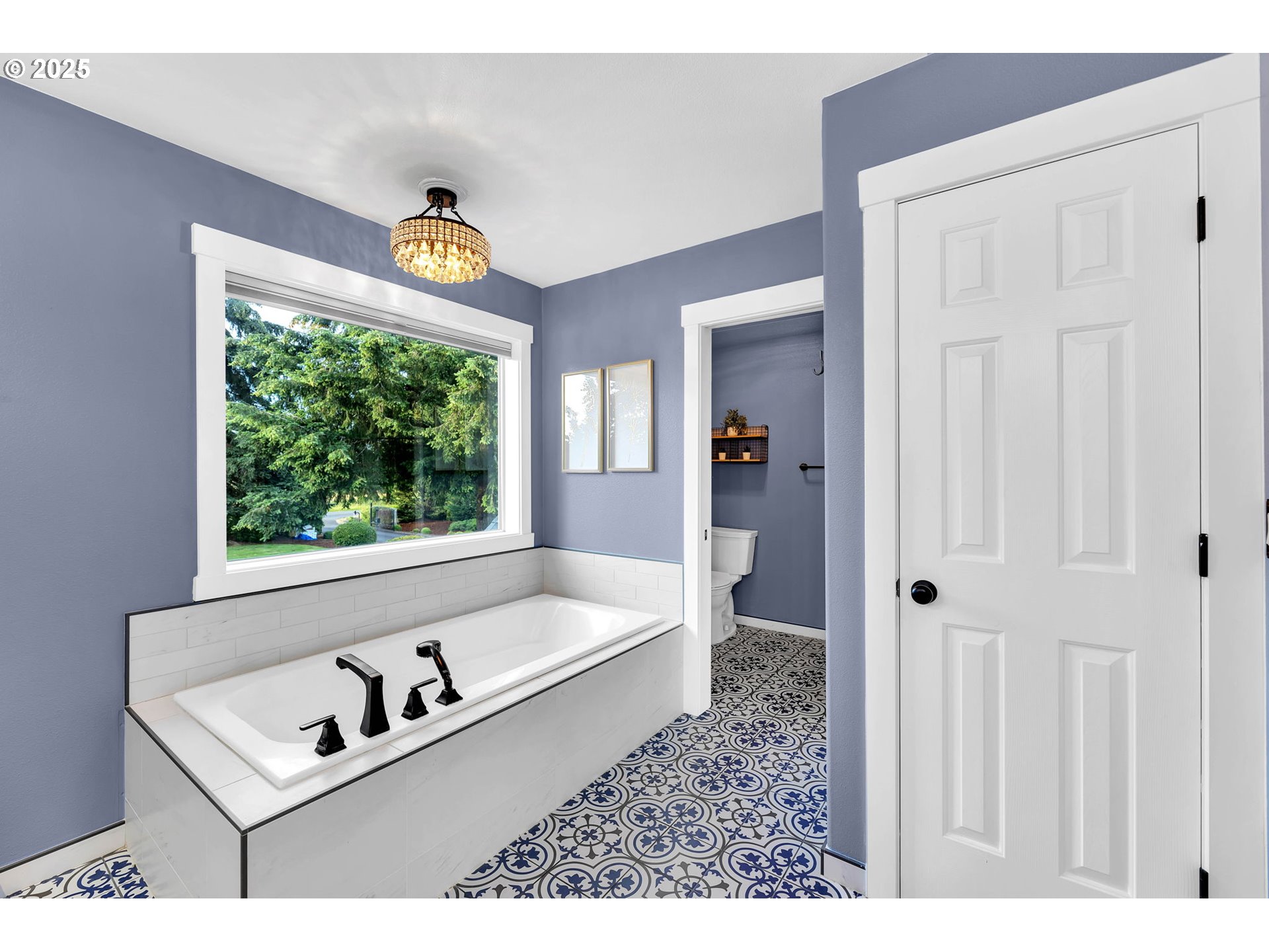 8805 Northeast 179th Street Battle Ground, WA 98604 - Photo 30 of 48 a white bath tub sitting next to a window