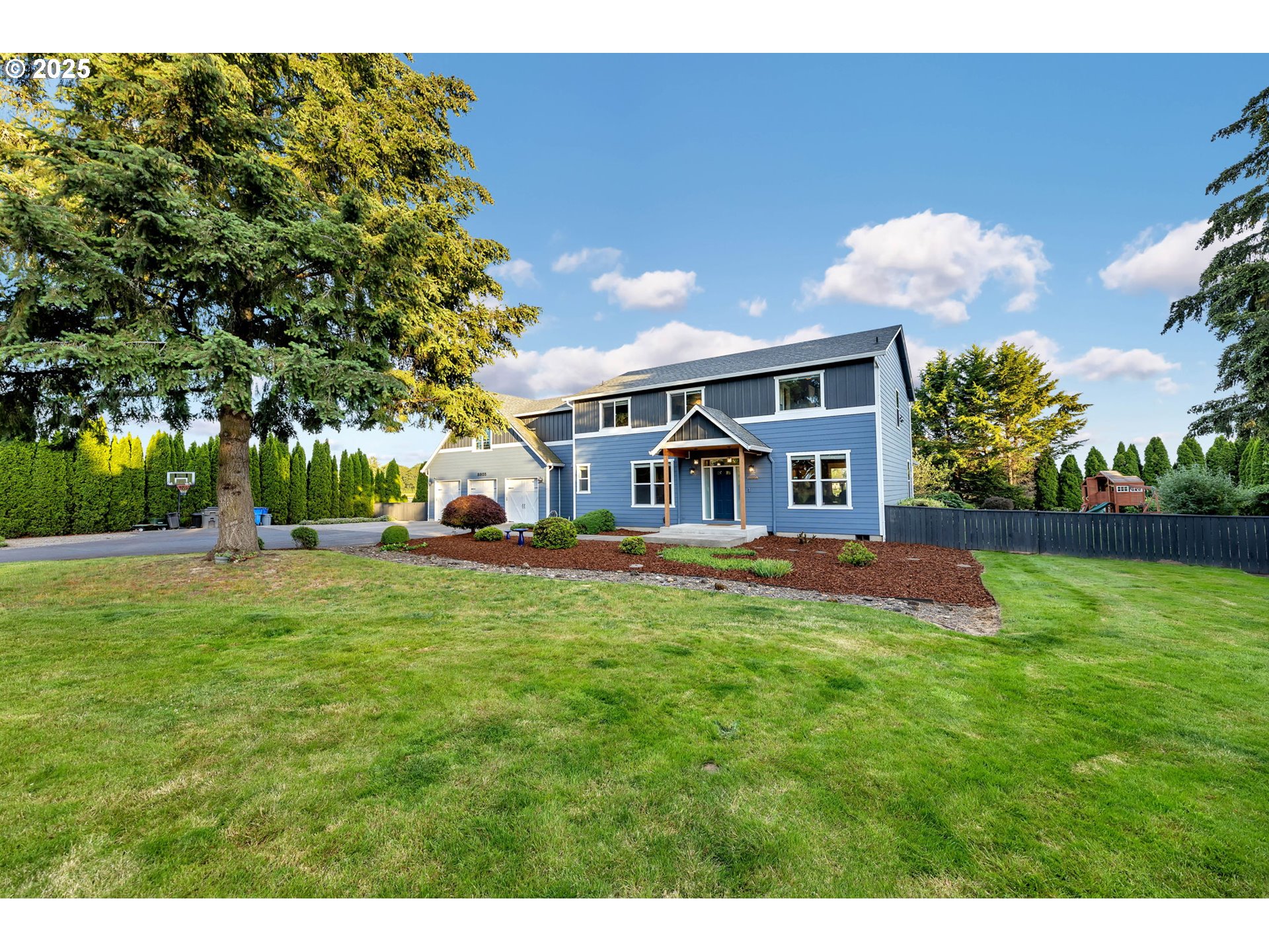 8805 Northeast 179th Street Battle Ground, WA 98604 - Photo 3 of 48 a view of a house with a big yard