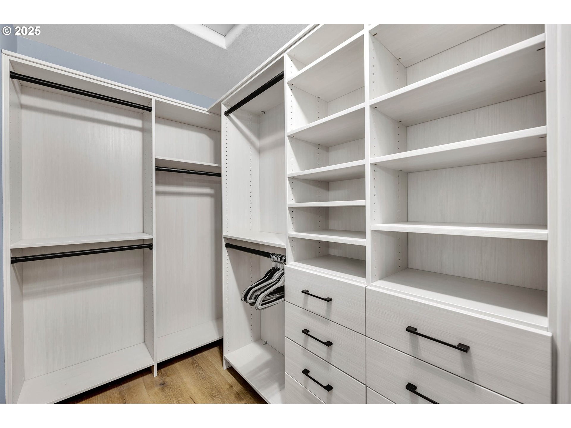 8805 Northeast 179th Street Battle Ground, WA 98604 - Photo 31 of 48 a view of cabinets and refrigerator in a kitchen