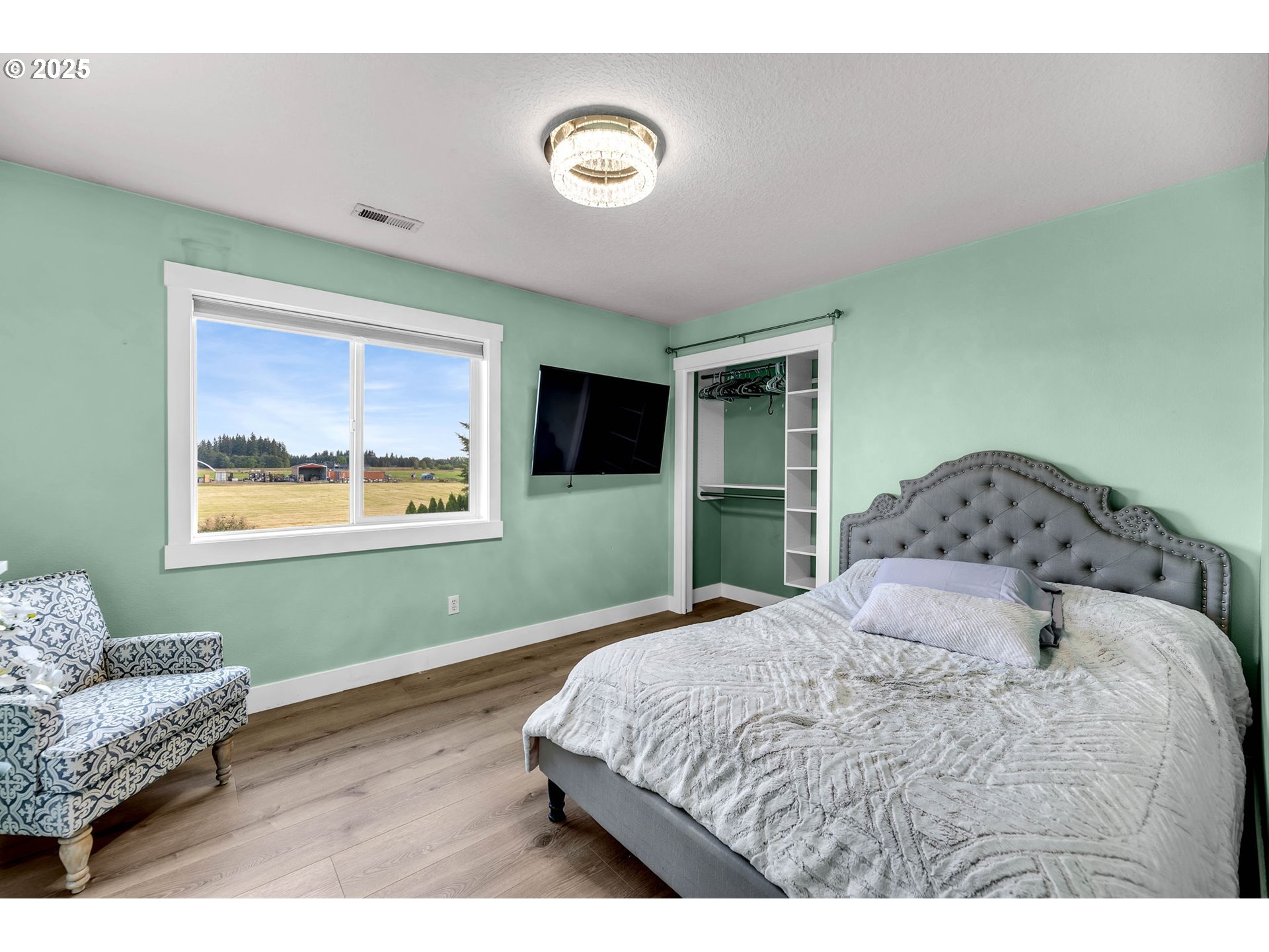 8805 Northeast 179th Street Battle Ground, WA 98604 - Photo 33 of 48 a bedroom with a bed and a window