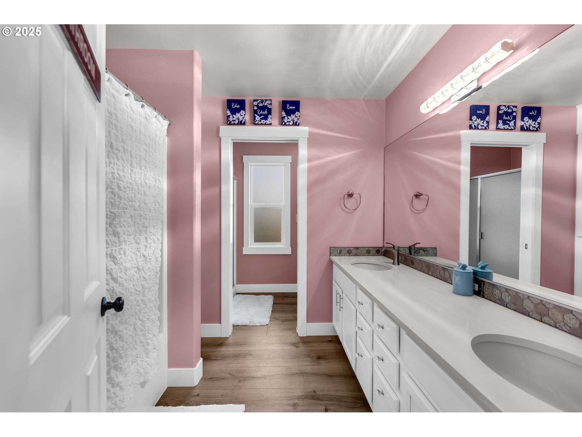 8805 Northeast 179th Street Battle Ground, WA 98604 - Photo 34 of 48 a bathroom with a tub sink and a mirror