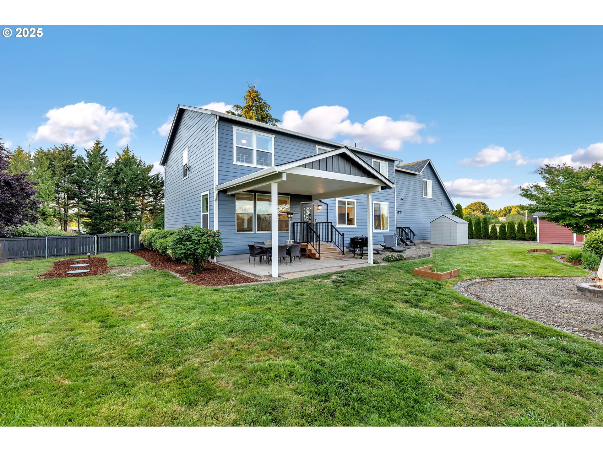 8805 Northeast 179th Street Battle Ground, WA 98604 - Photo 45 of 48 a view of a house with a backyard porch and furniture