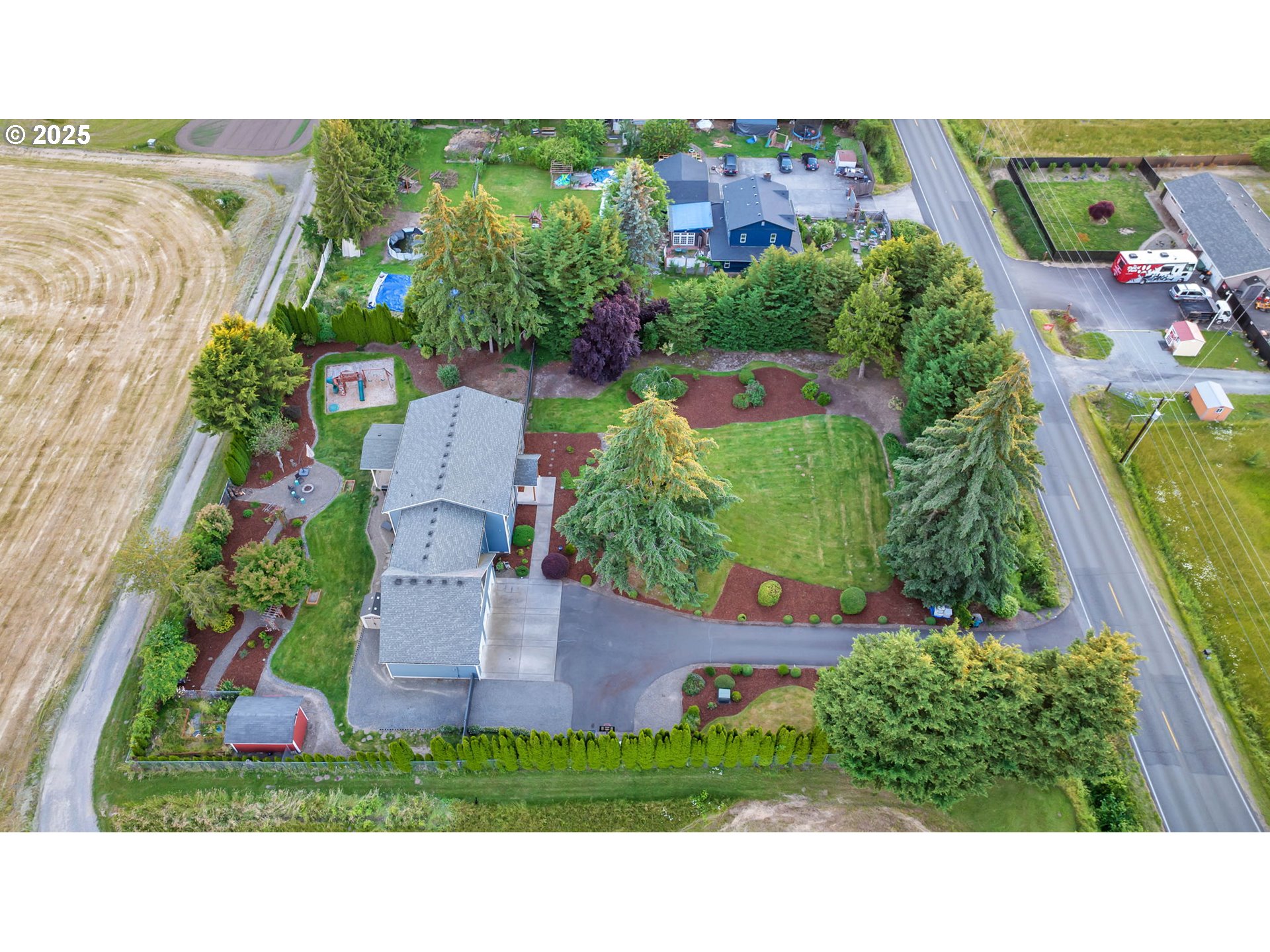 8805 Northeast 179th Street Battle Ground, WA 98604 - Photo 46 of 48 an aerial view of a house with a garden