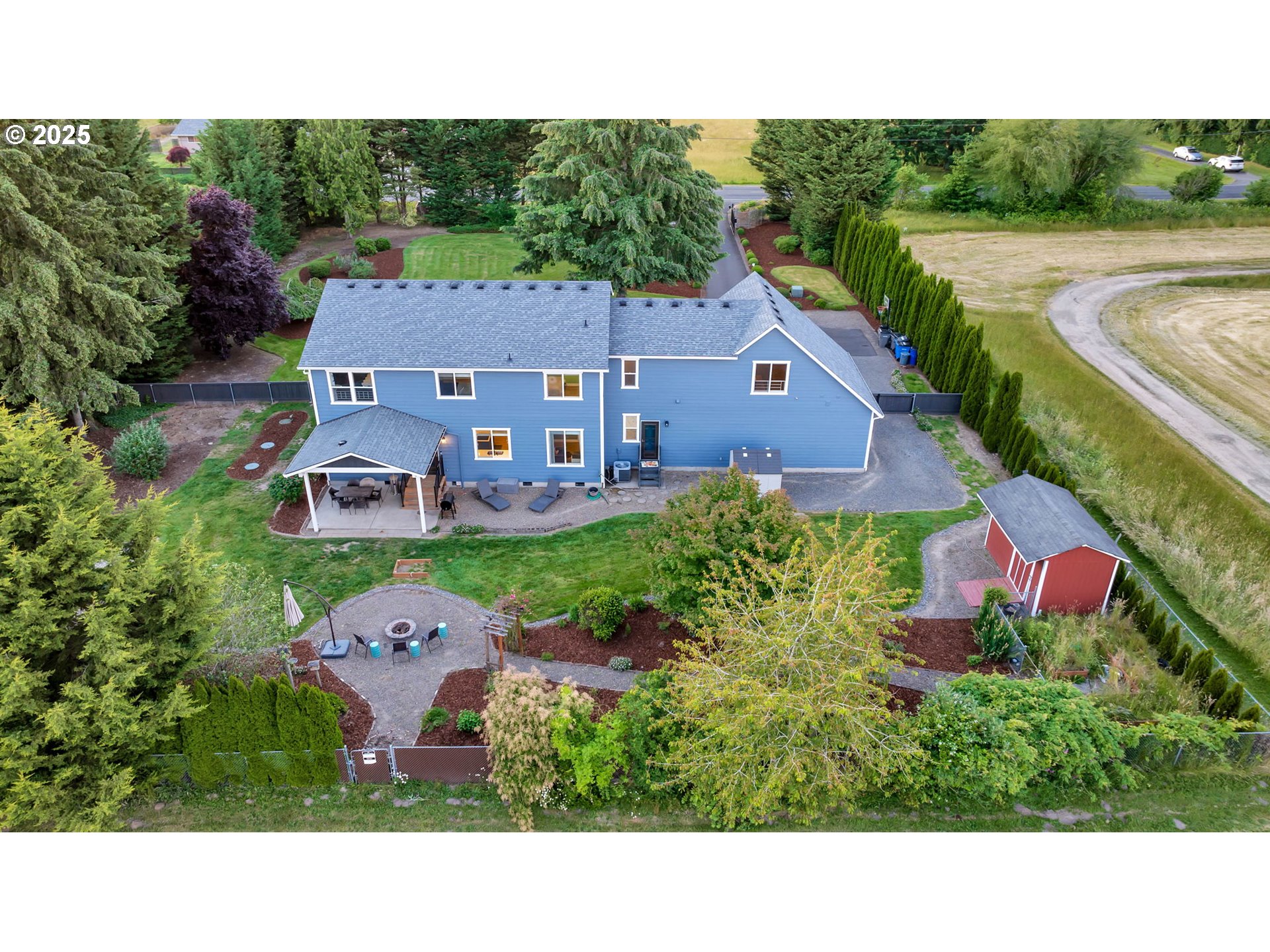 8805 Northeast 179th Street Battle Ground, WA 98604 - Photo 48 of 48 a view of a house with a backyard