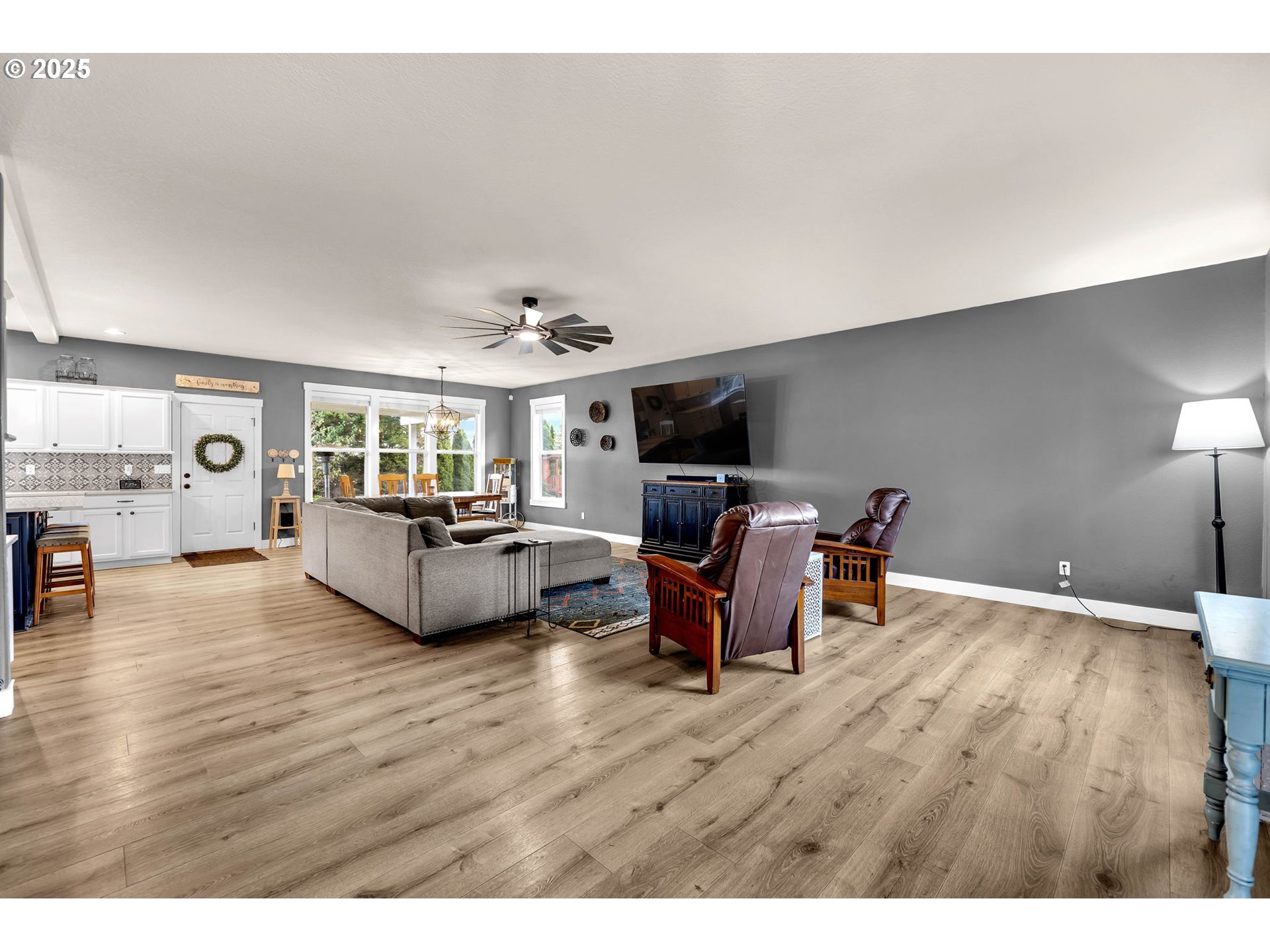 8805 Northeast 179th Street Battle Ground, WA 98604 - Photo 6 of 48 a living room with furniture and a wooden floor