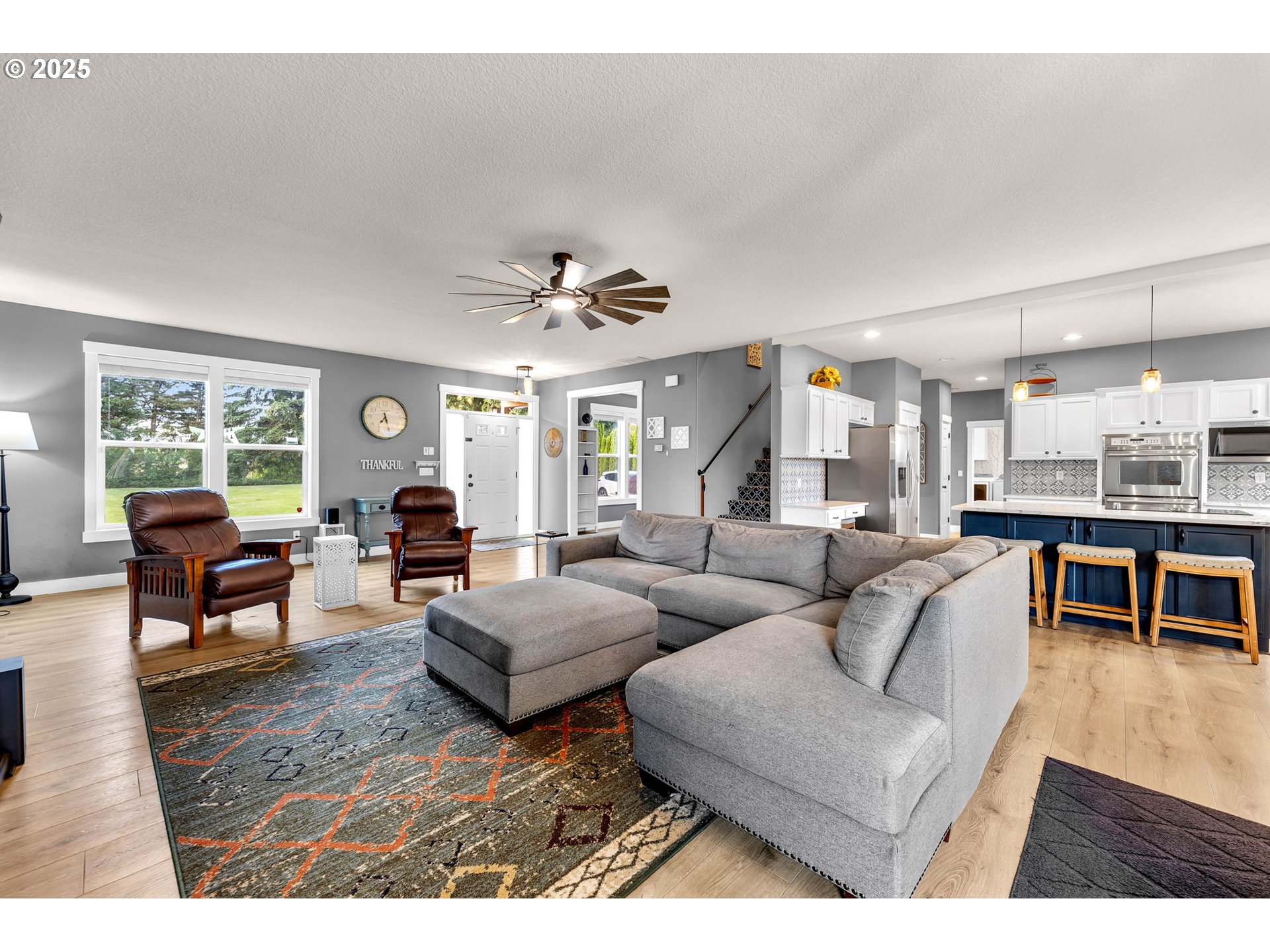 8805 Northeast 179th Street Battle Ground, WA 98604 - Photo 7 of 48 a living room with furniture and a large window