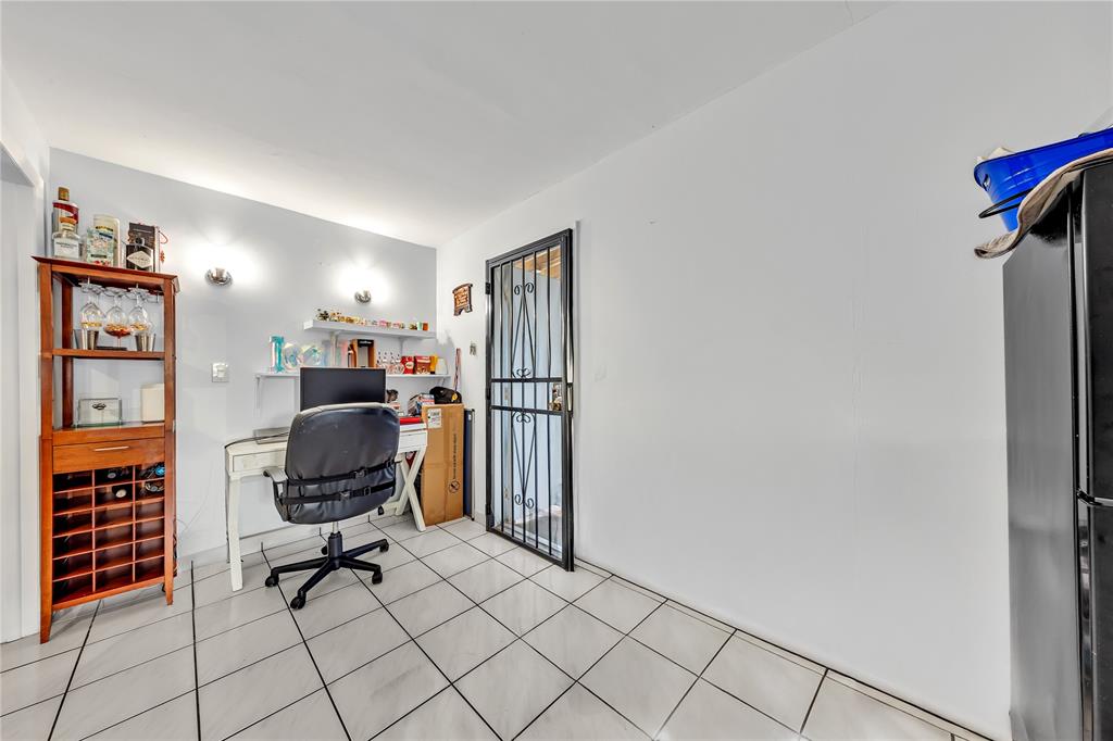 9311 Broad Manor Road Miami, FL 33147 - Photo 12 of 32 a view of a workspace with furniture