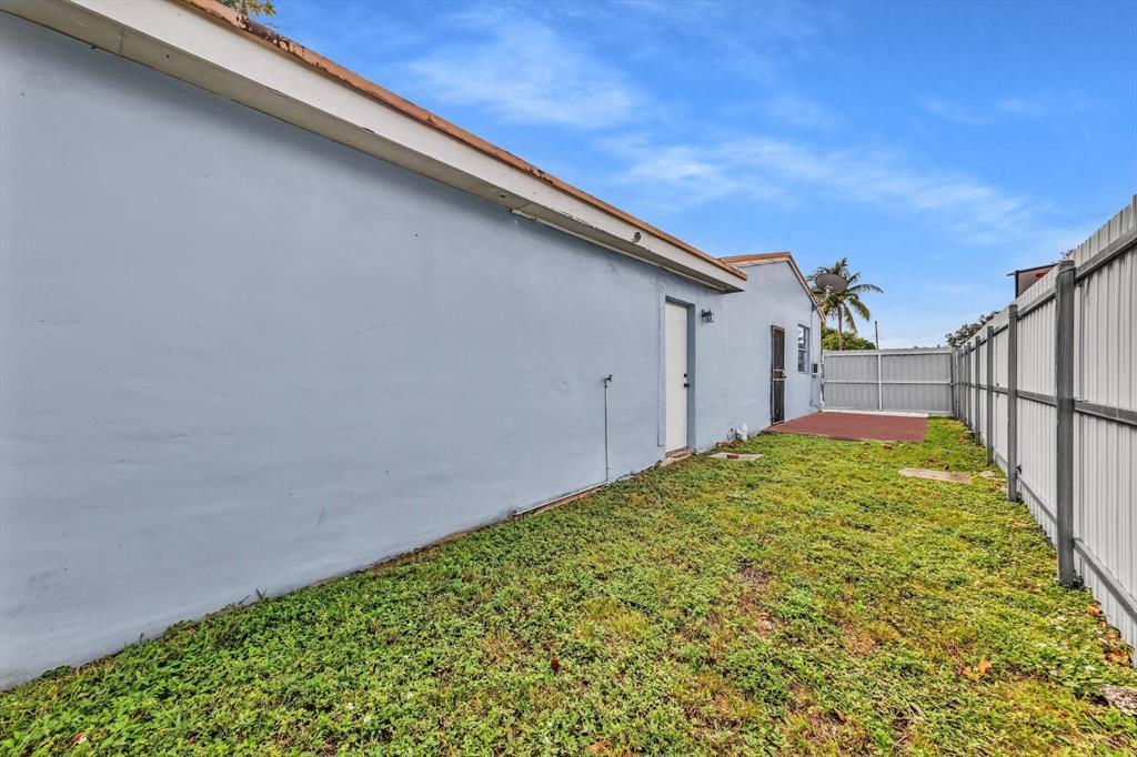 9311 Broad Manor Road Miami, FL 33147 - Photo 5 of 32 a view of a backyard
