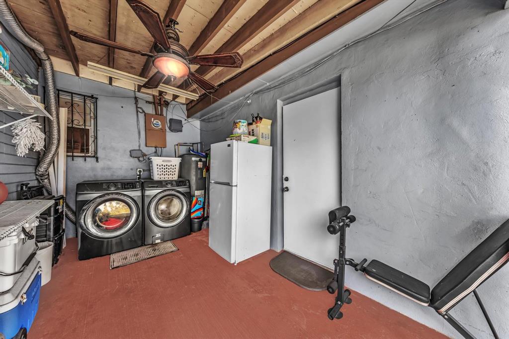 9311 Broad Manor Road Miami, FL 33147 - Photo 8 of 32 a view of a storage & utility room with washer and dryer