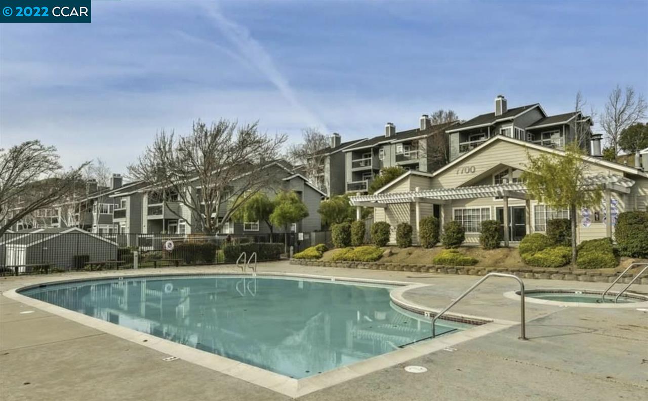 7650 Canyon Meadows Circle, Unit G Pleasanton, CA 94588 - Photo 23 of 24 a view of house with a swimming pool