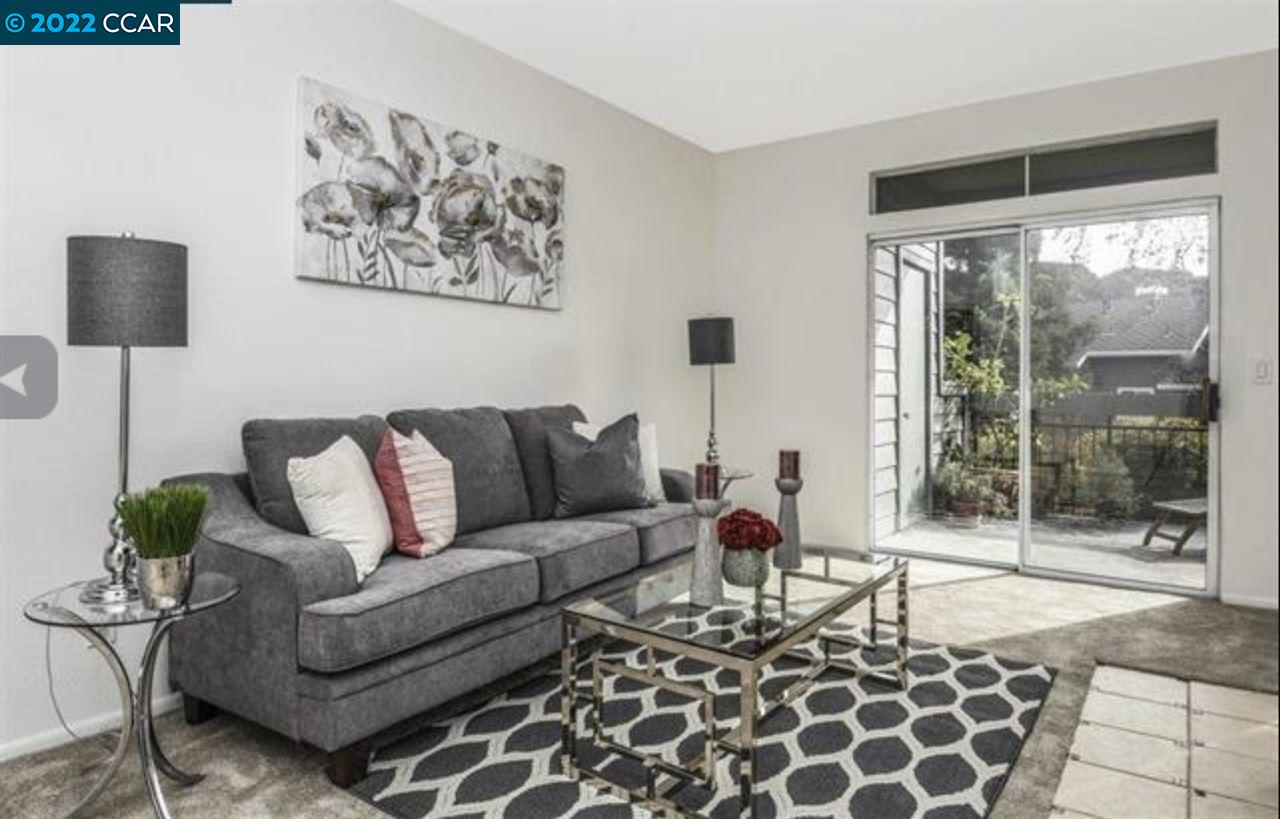 7650 Canyon Meadows Circle, Unit G Pleasanton, CA 94588 - Photo 7 of 24 a living room with furniture and a window
