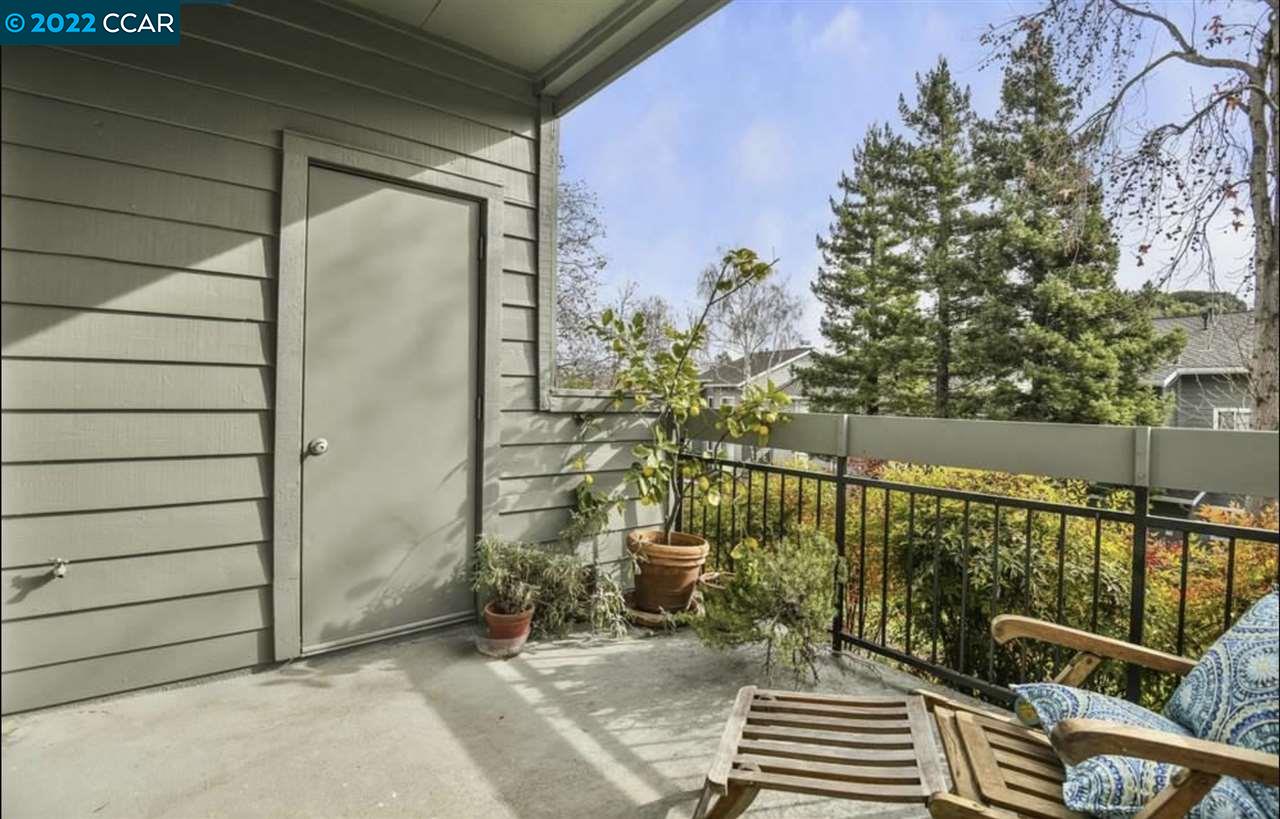 7650 Canyon Meadows Circle, Unit G Pleasanton, CA 94588 - Photo 8 of 24 a view of balcony with wooden floor and seating space
