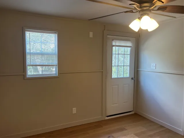 a bathroom with a glass shower door
