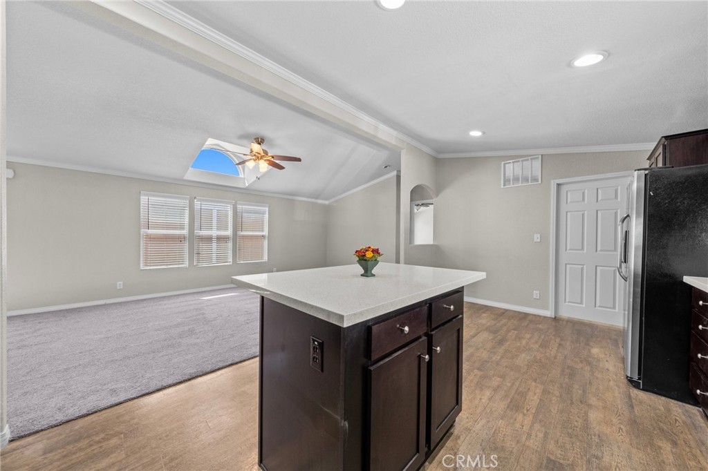 3909 Reche Road, Unit 194 Fallbrook, CA 92028 - Photo 16 of 37 a kitchen with a stove a refrigerator and a sink