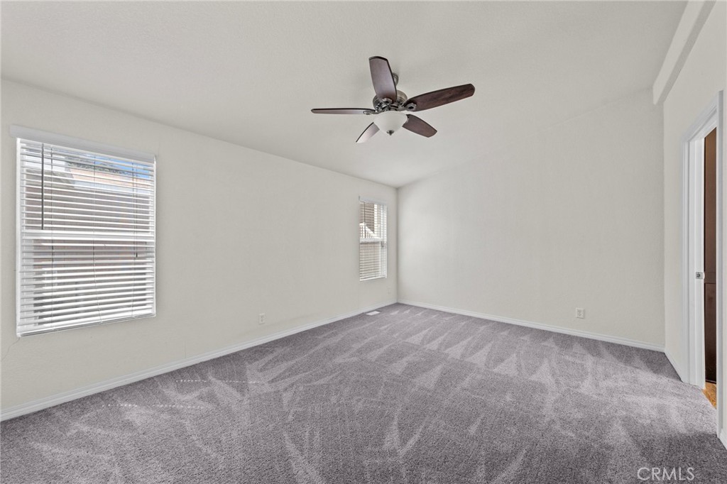 3909 Reche Road, Unit 194 Fallbrook, CA 92028 - Photo 19 of 37 a view of an empty room with a window