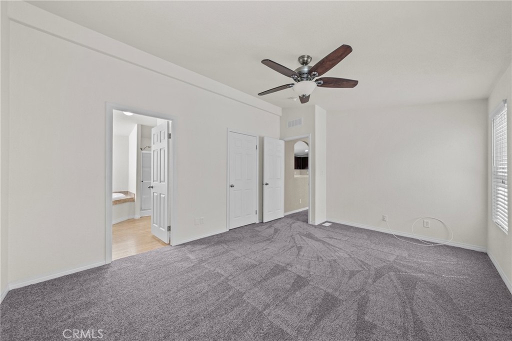3909 Reche Road, Unit 194 Fallbrook, CA 92028 - Photo 20 of 37 a view of empty room with a ceiling fan