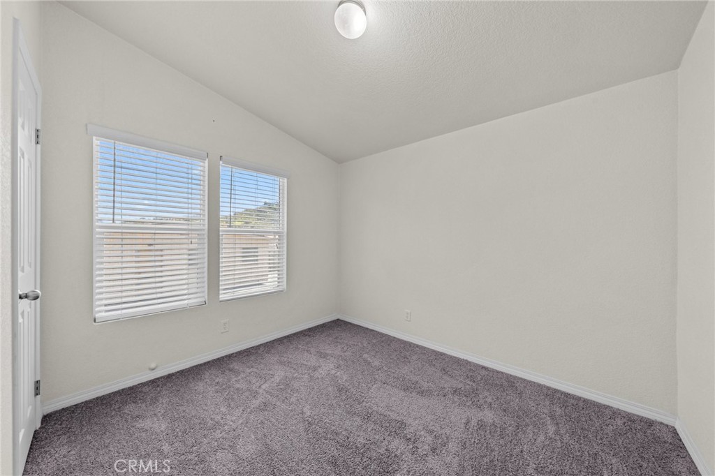 3909 Reche Road, Unit 194 Fallbrook, CA 92028 - Photo 26 of 37 a view of an empty room with a window