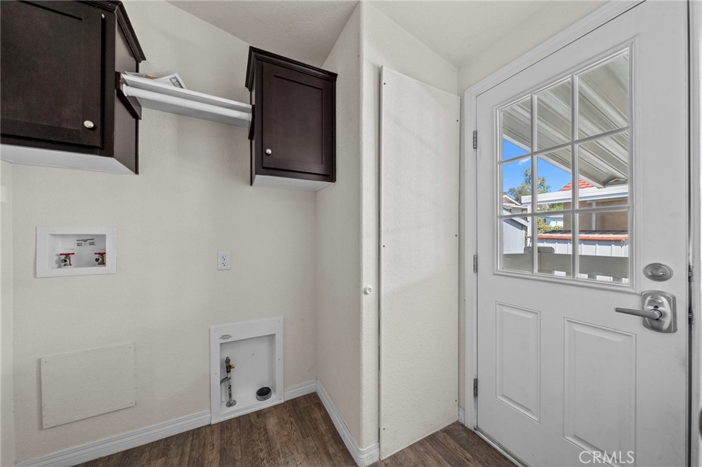 3909 Reche Road, Unit 194 Fallbrook, CA 92028 - Photo 28 of 37 a view of storage and utility room with wooden floor