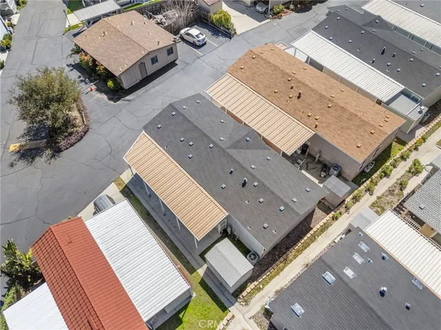an aerial view of a house with outdoor space