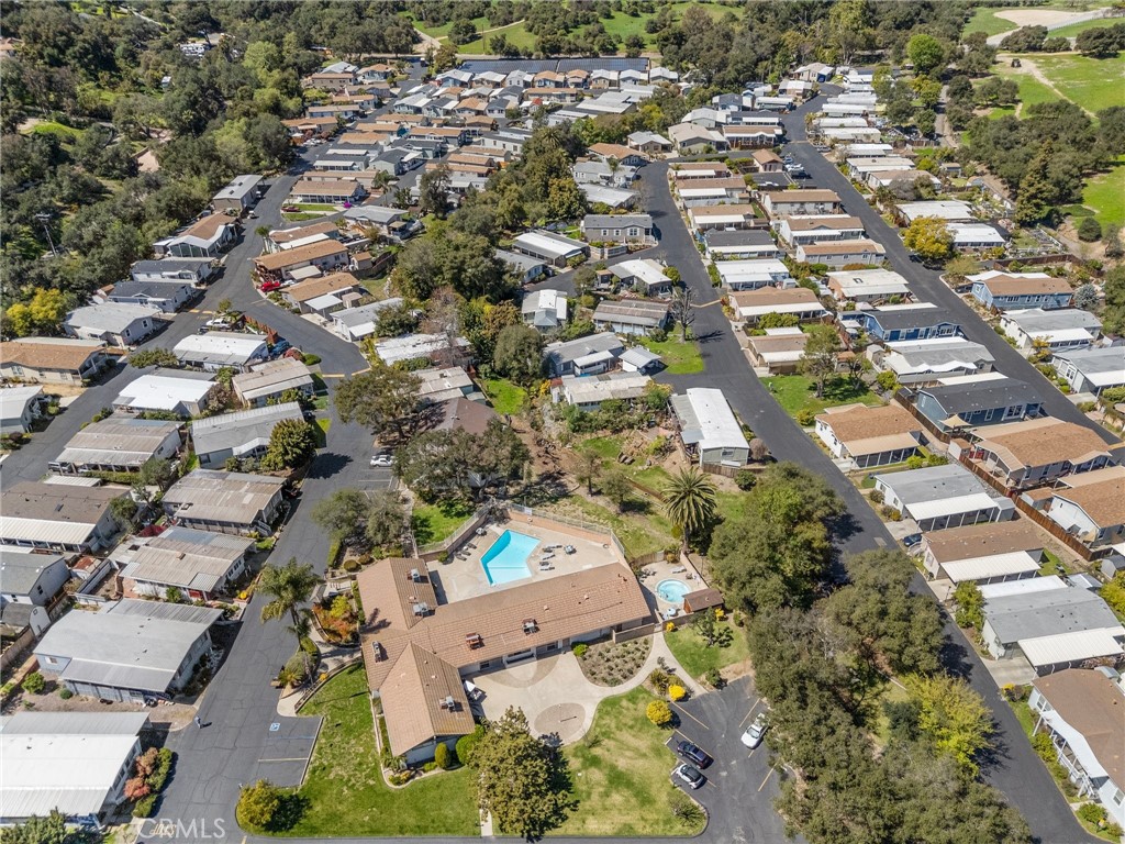 3909 Reche Road, Unit 194 Fallbrook, CA 92028 - Photo 36 of 37 an aerial view of residential houses with outdoor space