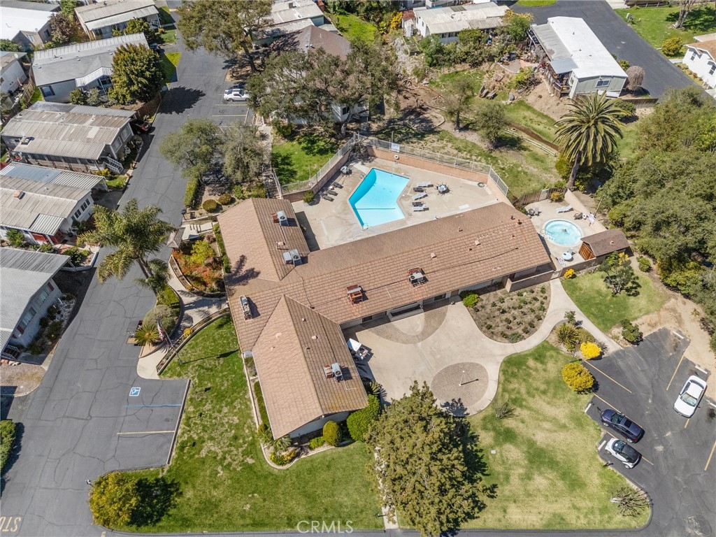 3909 Reche Road, Unit 194 Fallbrook, CA 92028 - Photo 37 of 37 an aerial view of a house with a yard and trees